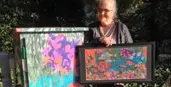 Artist with artwork